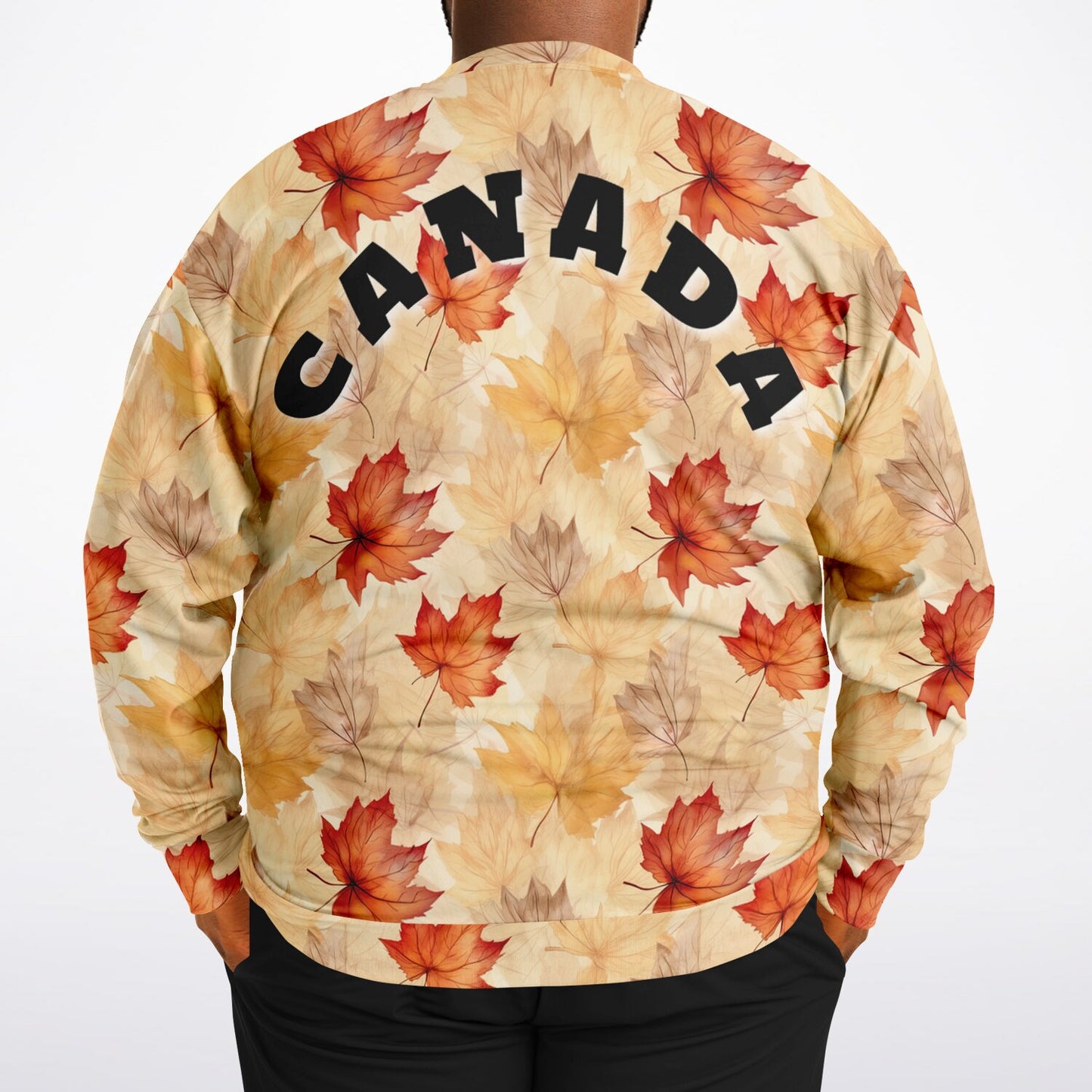 Sweatshirt with autumn leaf pattern and 'Canada' text on a white background