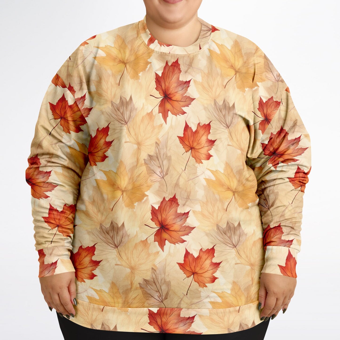 Sweatshirt with autumn leaf pattern worn by a person on a white background
