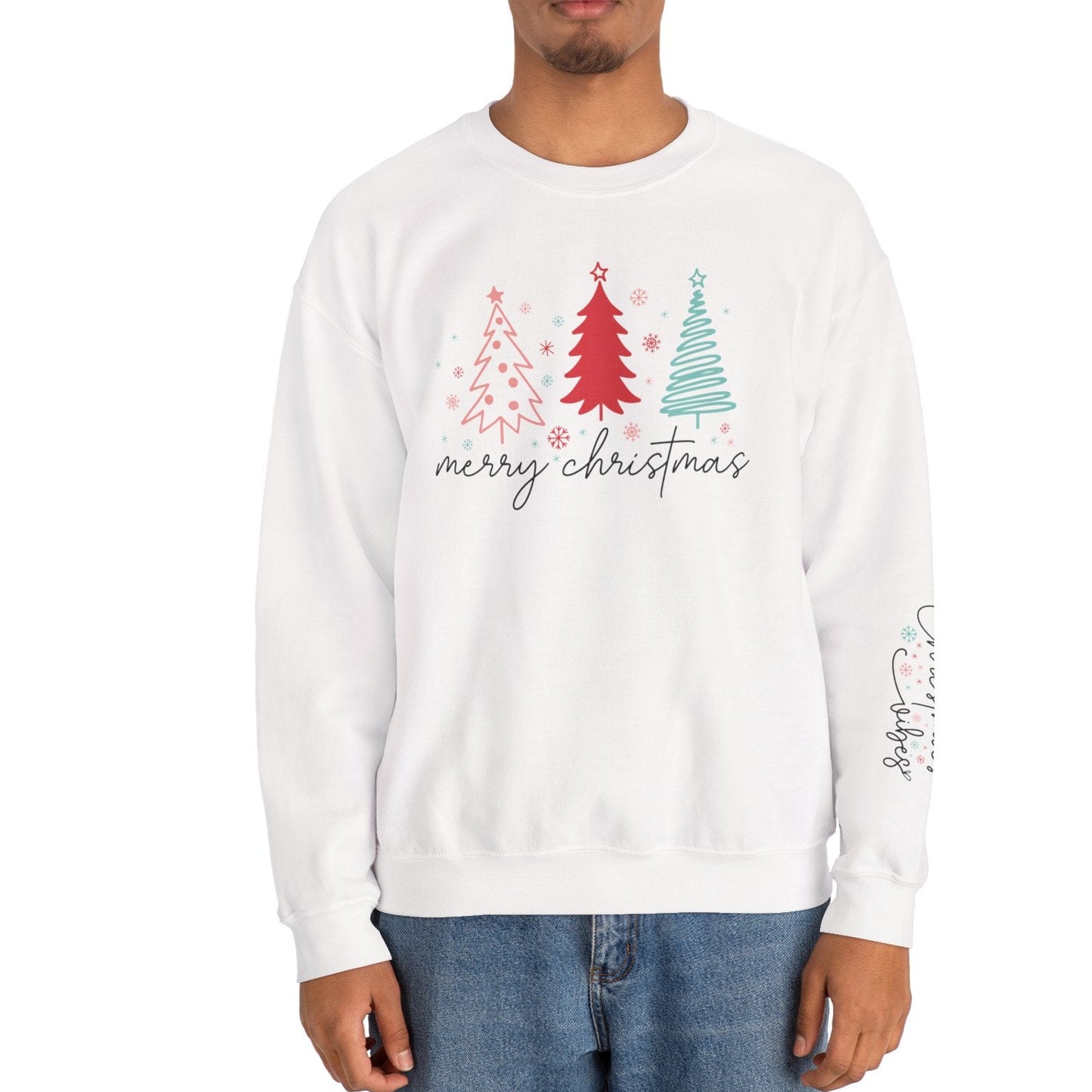 Person wearing a white sweatshirt with Christmas tree design and 'merry christmas' text on a white background