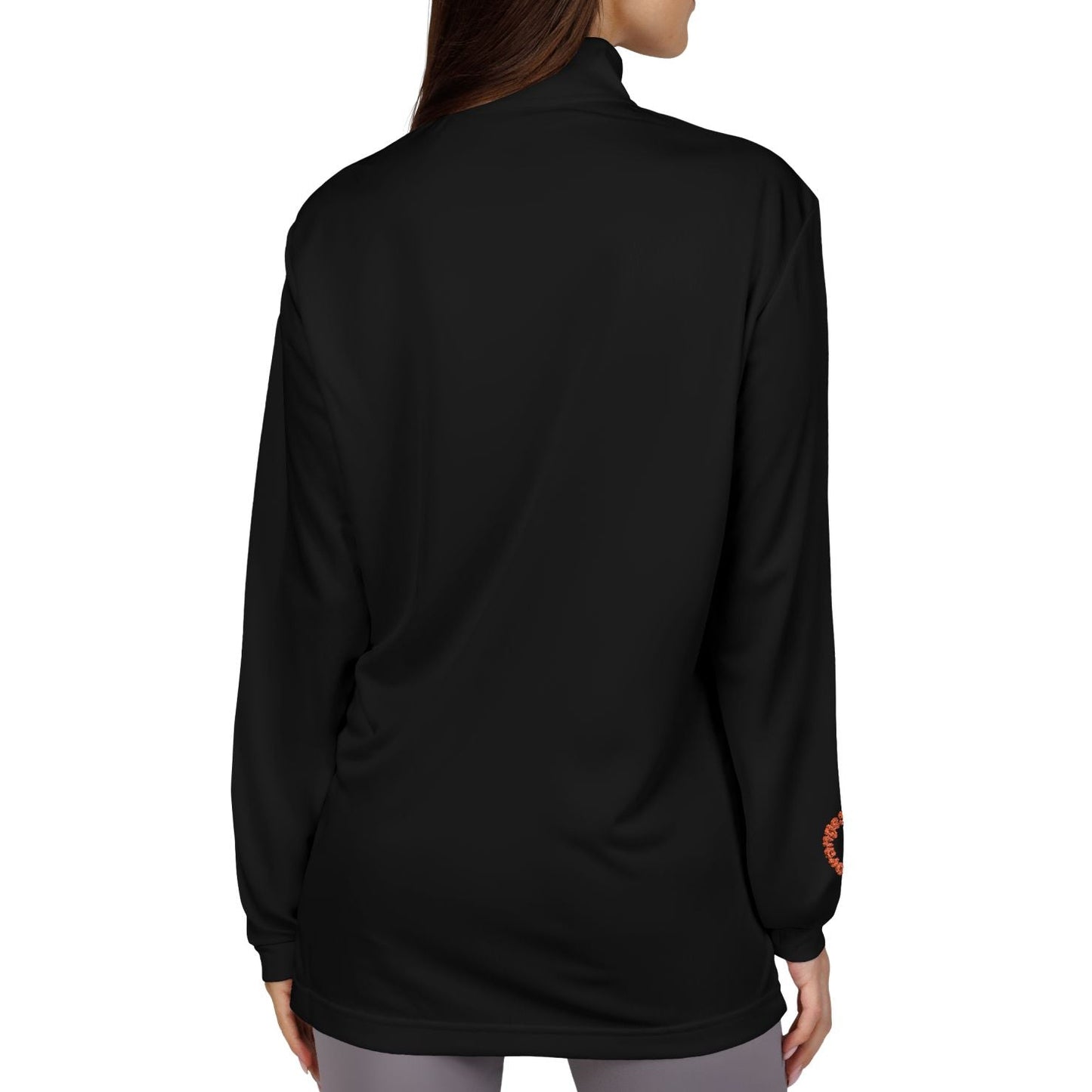 Person wearing a black long-sleeve shirt on a white background