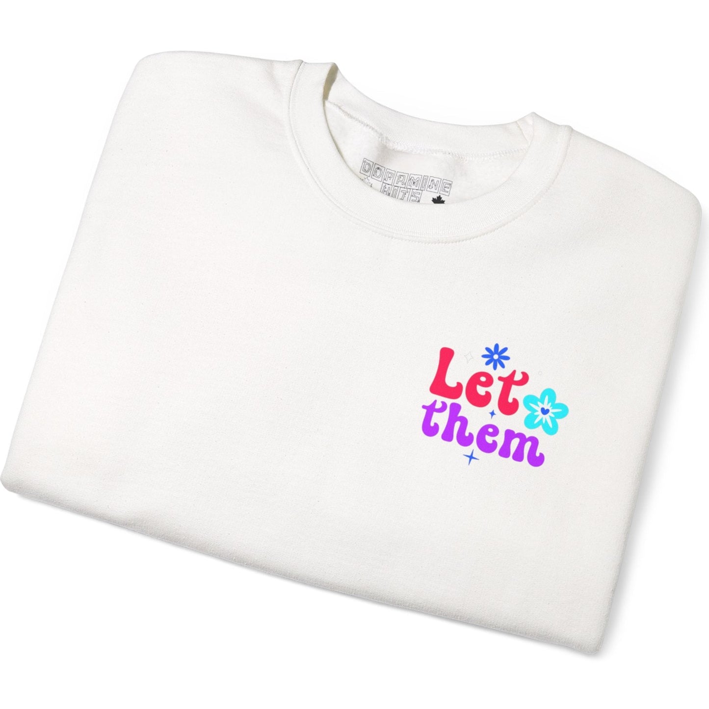 White t-shirt with colorful text and flower graphic on a white background
