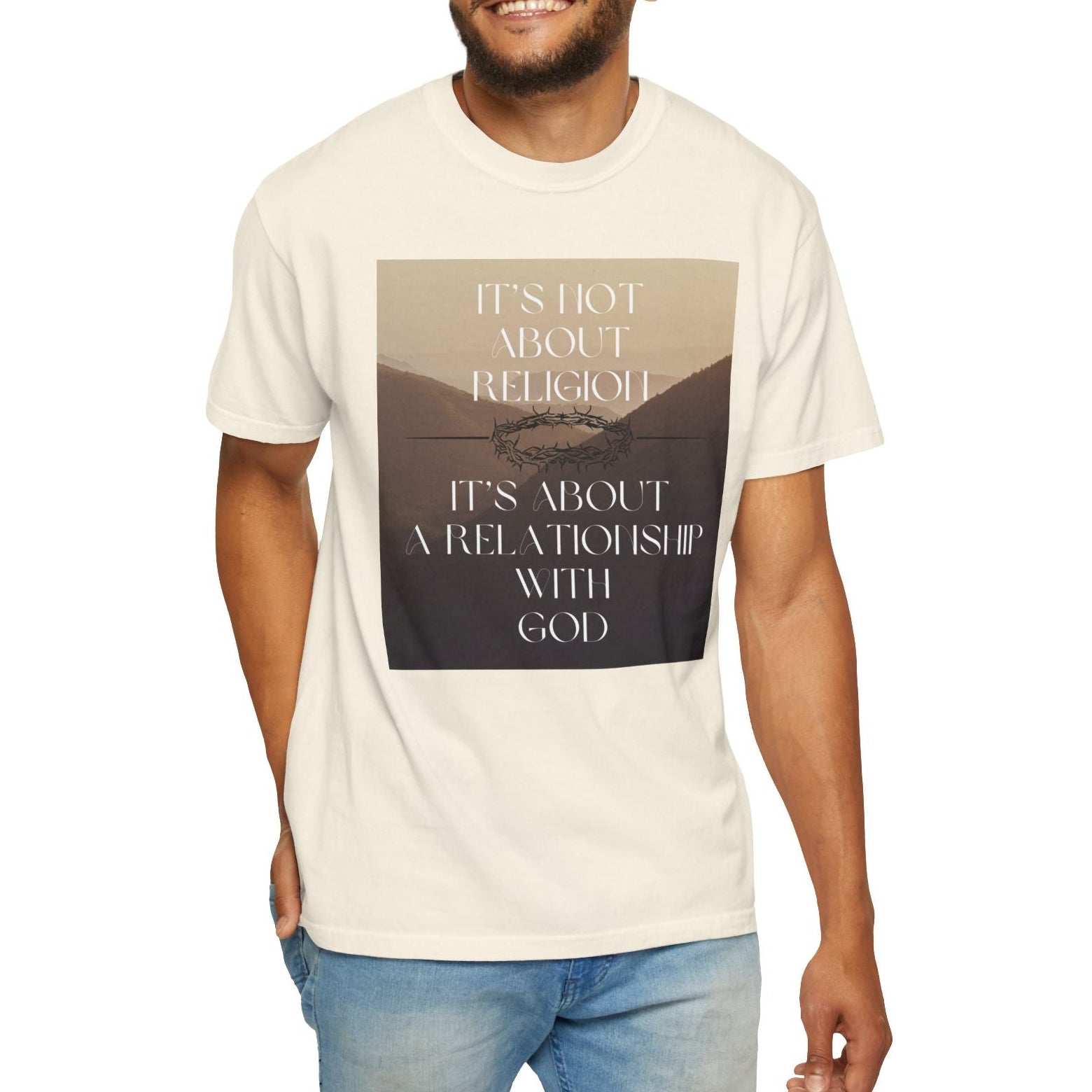 Man wearing a t-shirt with a printed design and text on a white background