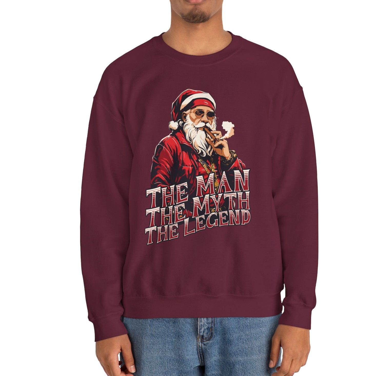 Person wearing a maroon sweatshirt with a graphic design and text on a white background