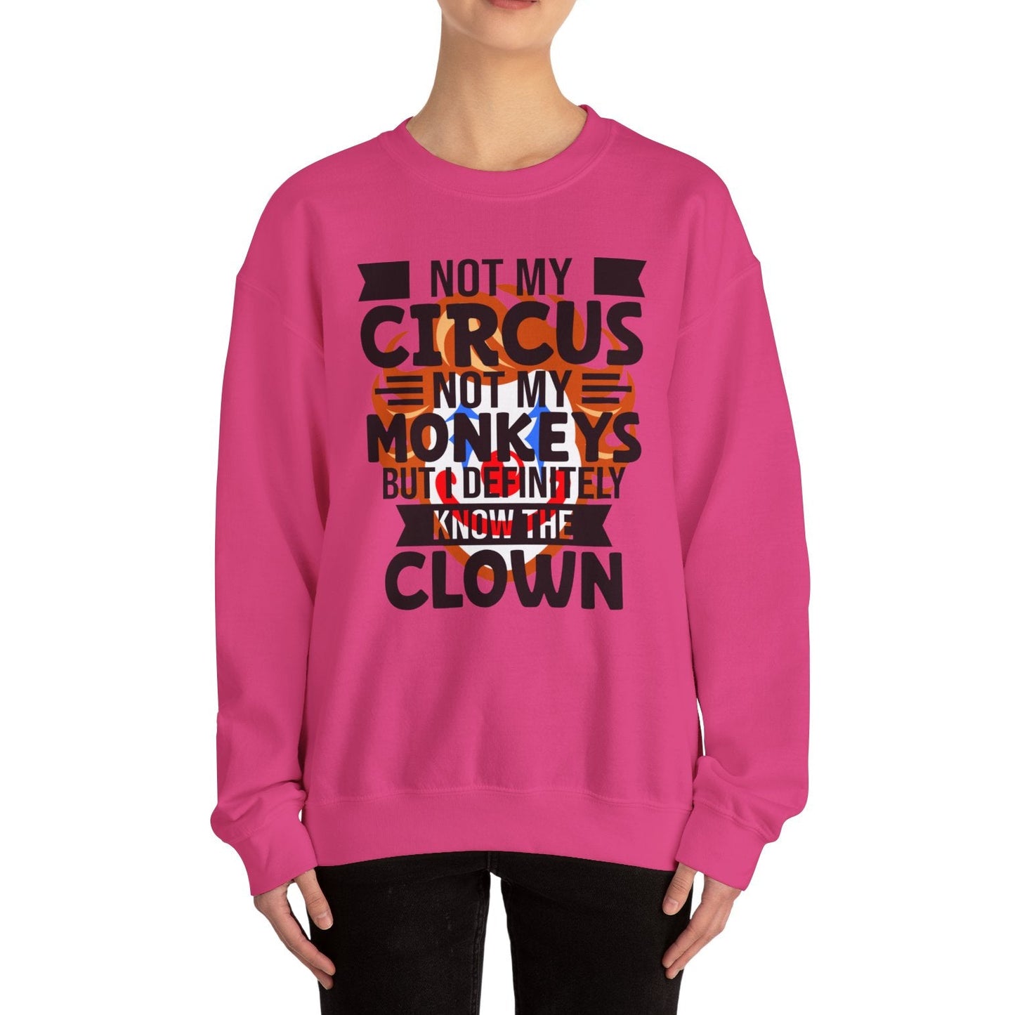 Person wearing a pink sweatshirt with text design on a white background