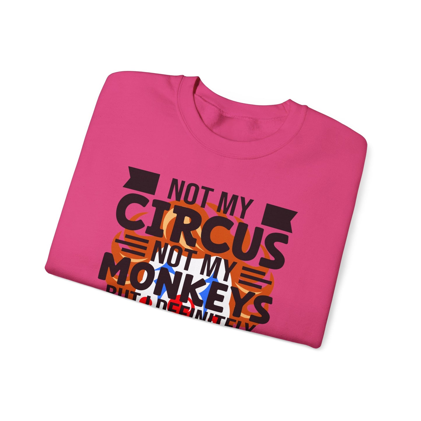 Folded pink sweatshirt  with 'Not My Circus Not My Monkeys' text on a white background