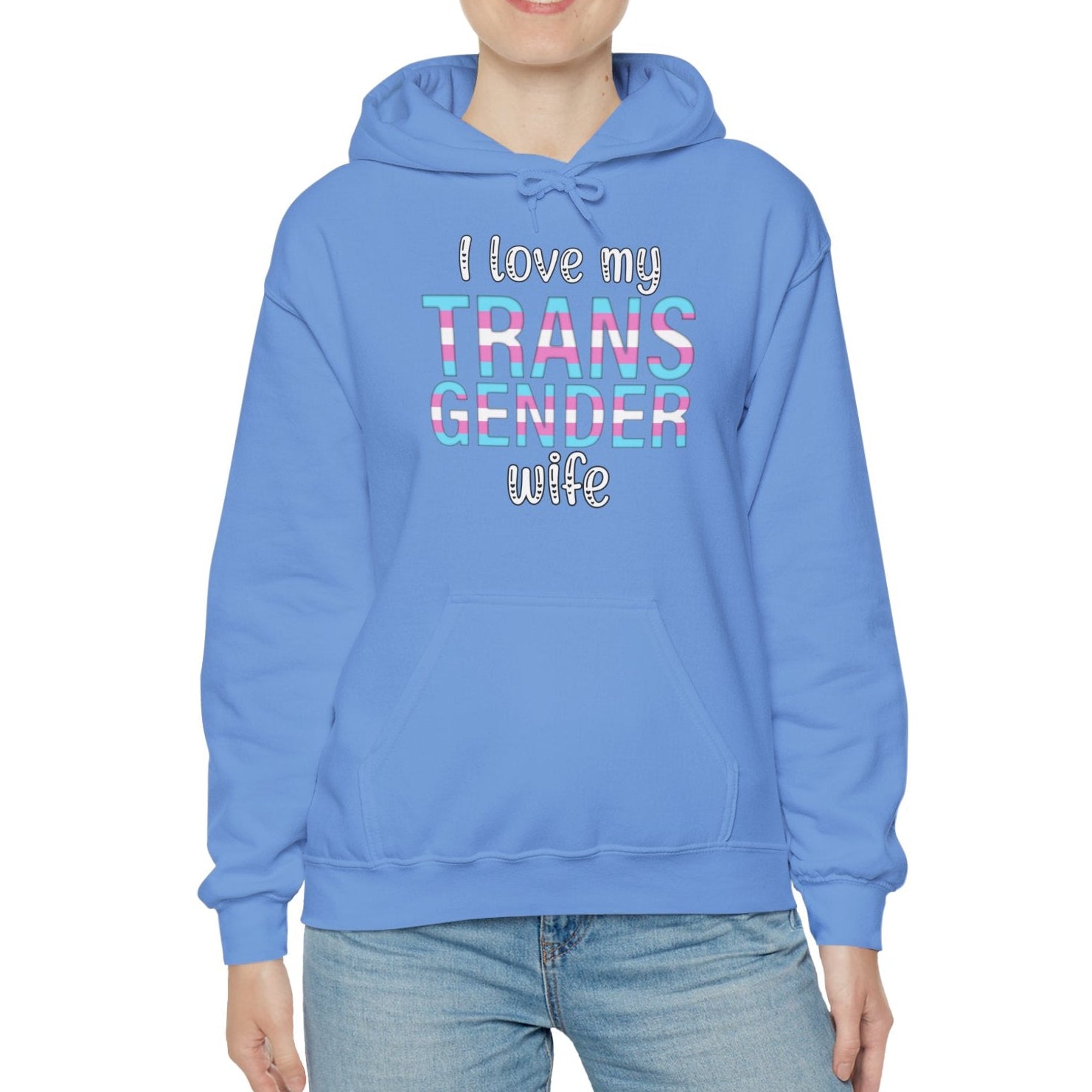 Person wearing a blue hoodie with 'I love my TRANS GENDER wife' text on a white background
