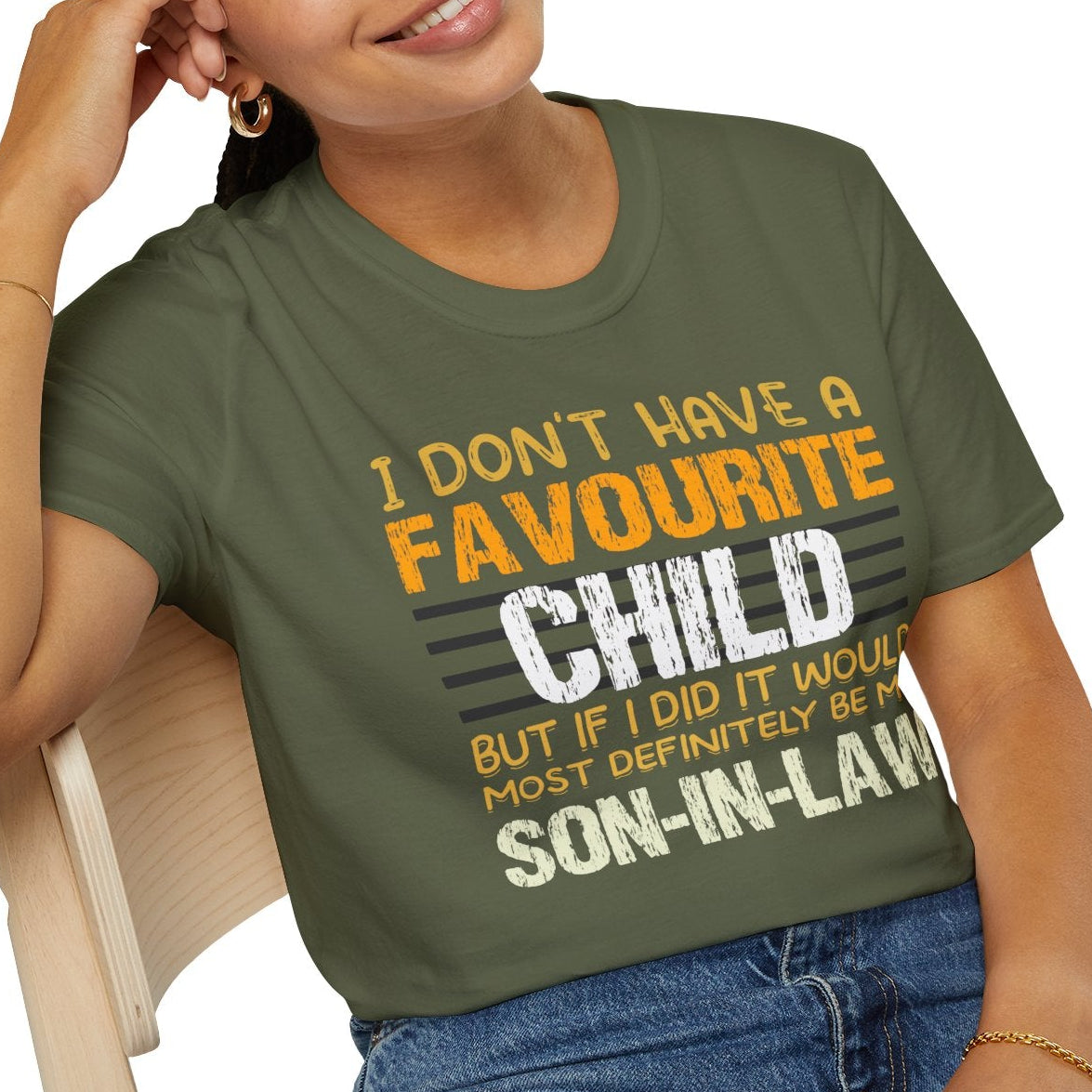 Person wearing a green t-shirt with humorous text design.
