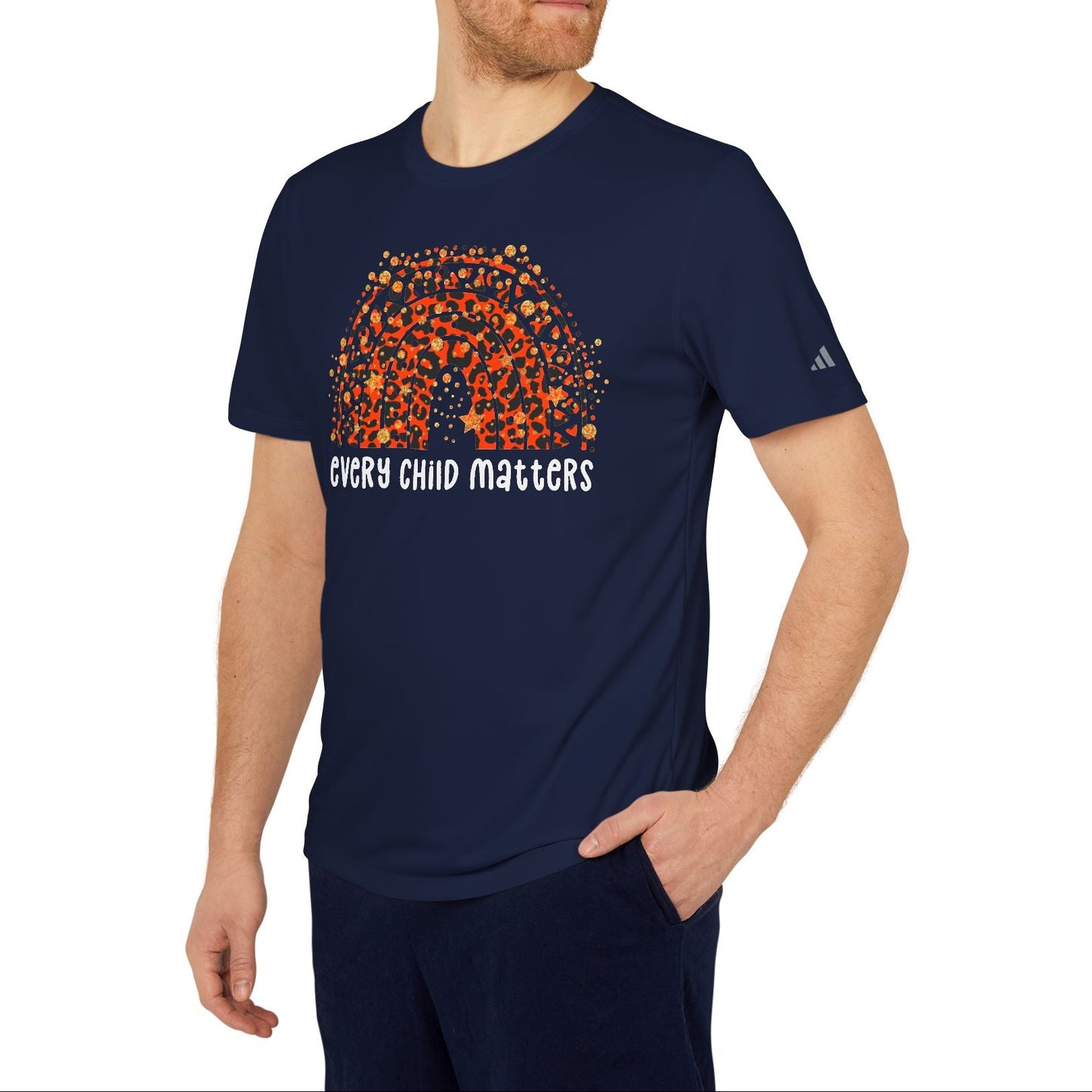 Man wearing a navy blue t-shirt with 'Every Child Matters' graphic and text on a white background