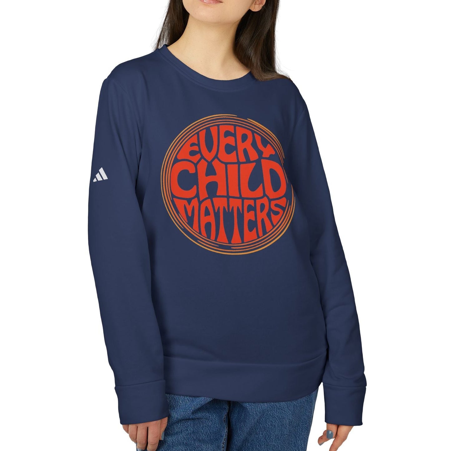Person wearing a navy blue sweatshirt with 'Every Child Matters' text on a white background