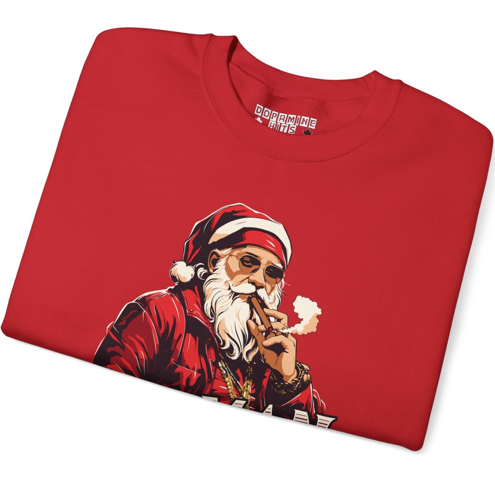 Folded red t-shirt with a graphic of a smoking Santa Claus on a white background
