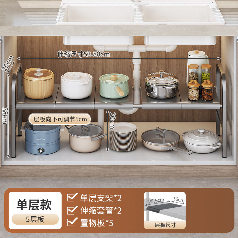 Kitchen shelf with various pots and pans on a wooden cabinet background