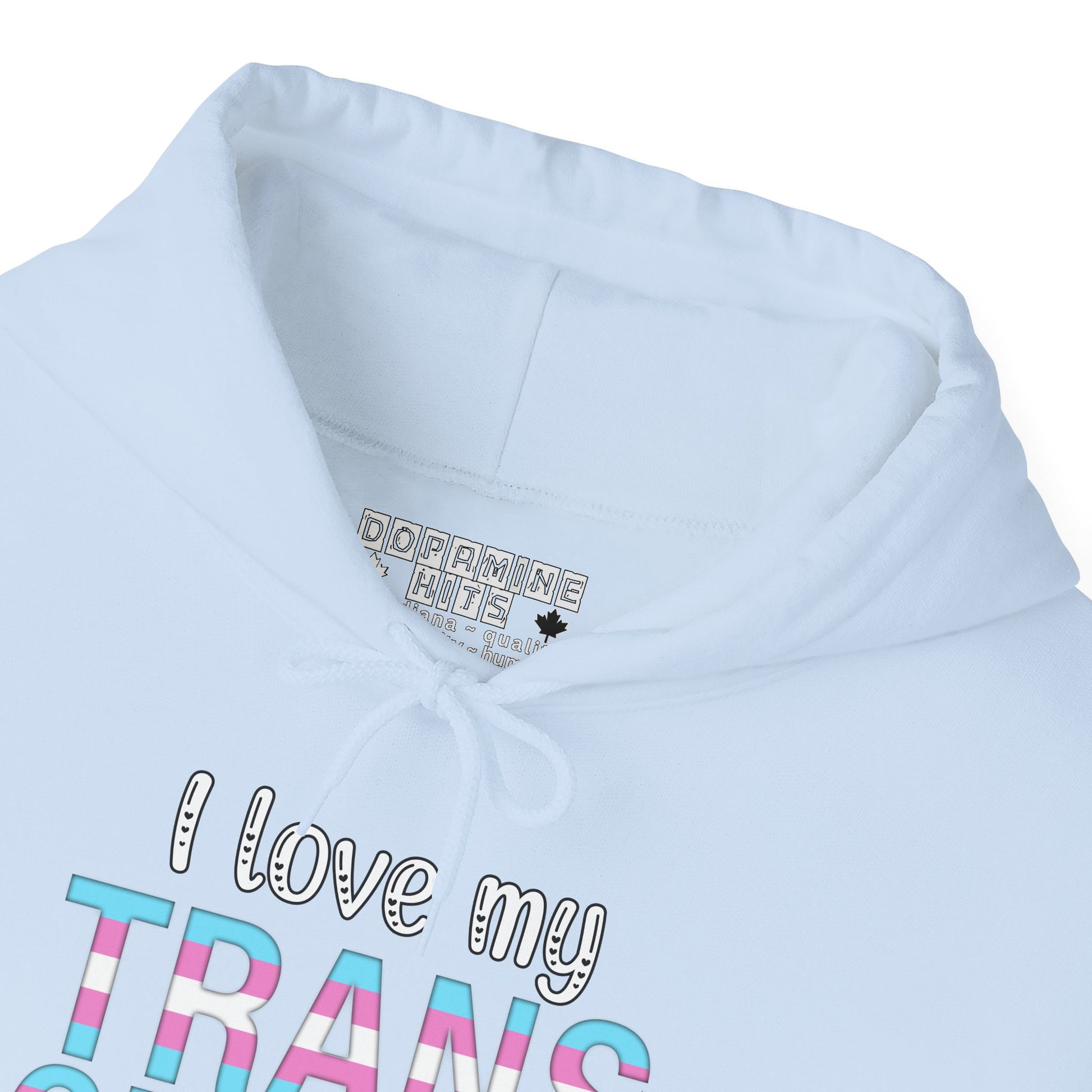Light blue hoodie with 'I love my TRANS' text and a brand label on a white background