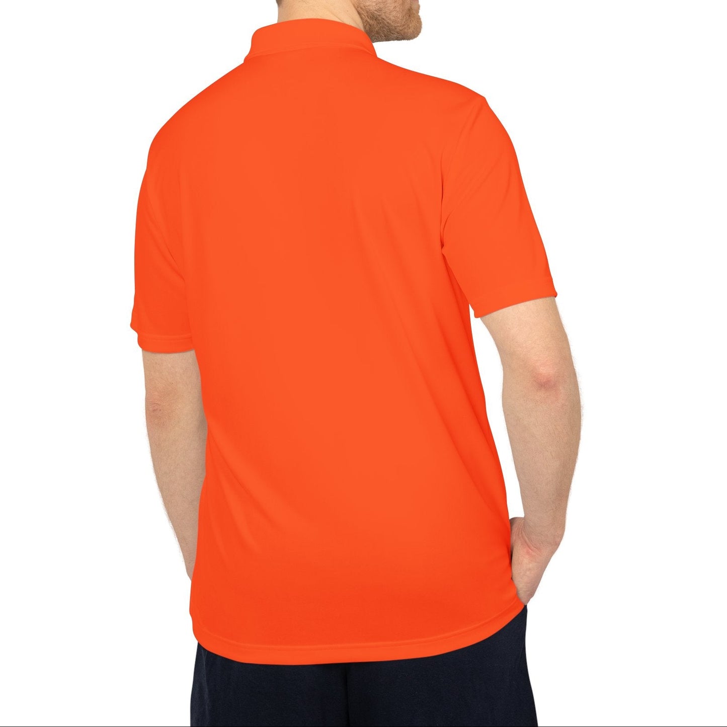 Man wearing an orange polo shirt on a white background