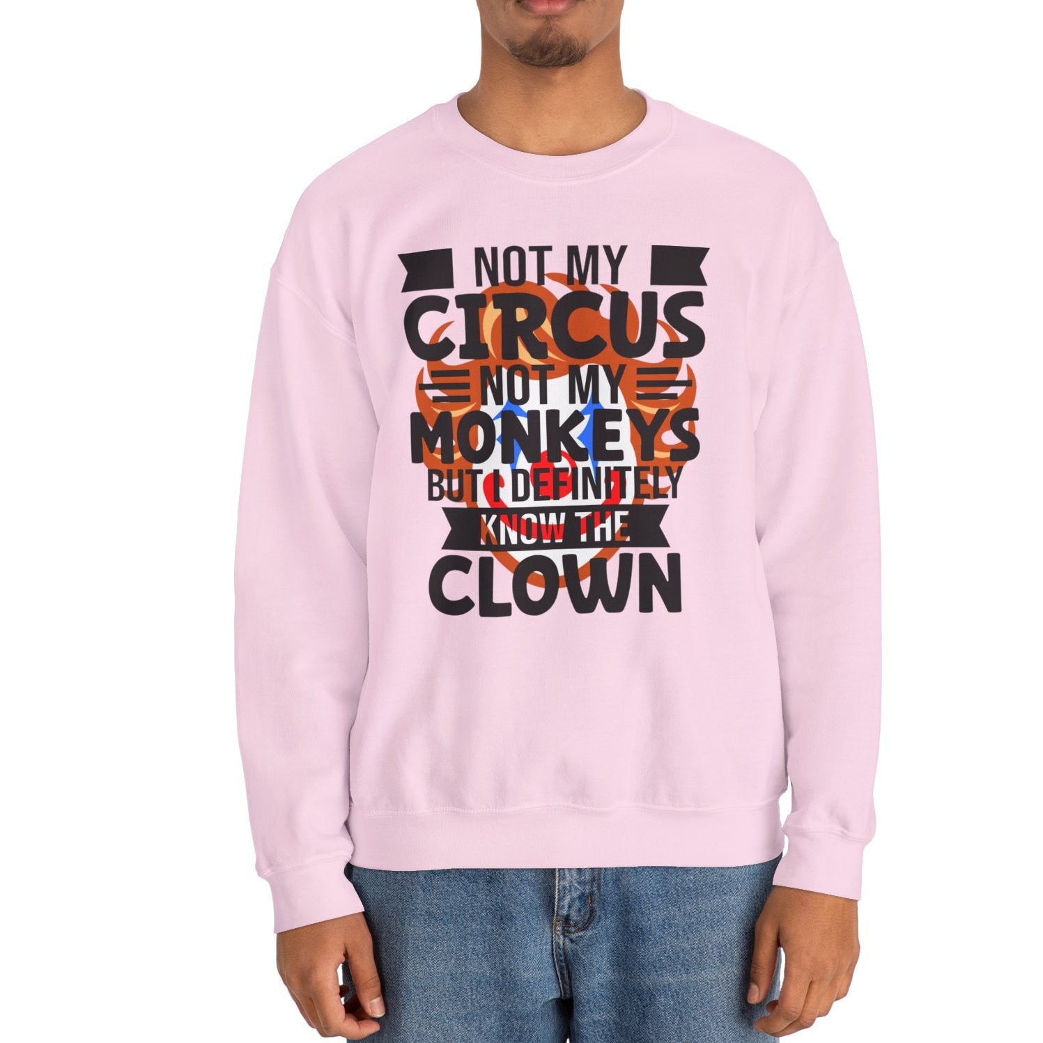 Person wearing a pink sweatshirt with text design on a white background