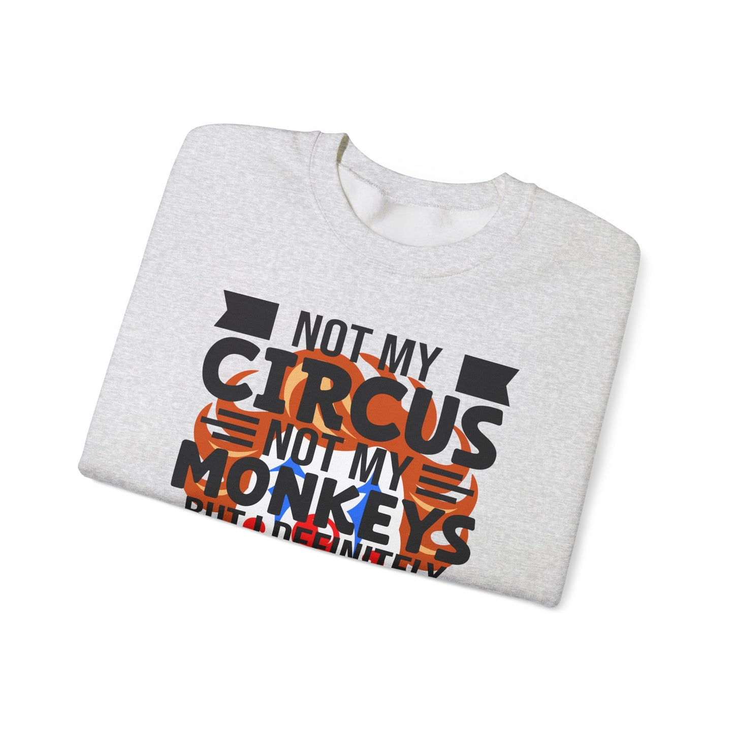 Folded gray sweatshirt with 'Not My Circus Not My Monkeys' text on a white background