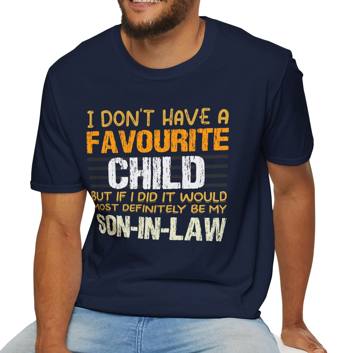 Man wearing a navy blue t-shirt with humorous text design on a white background