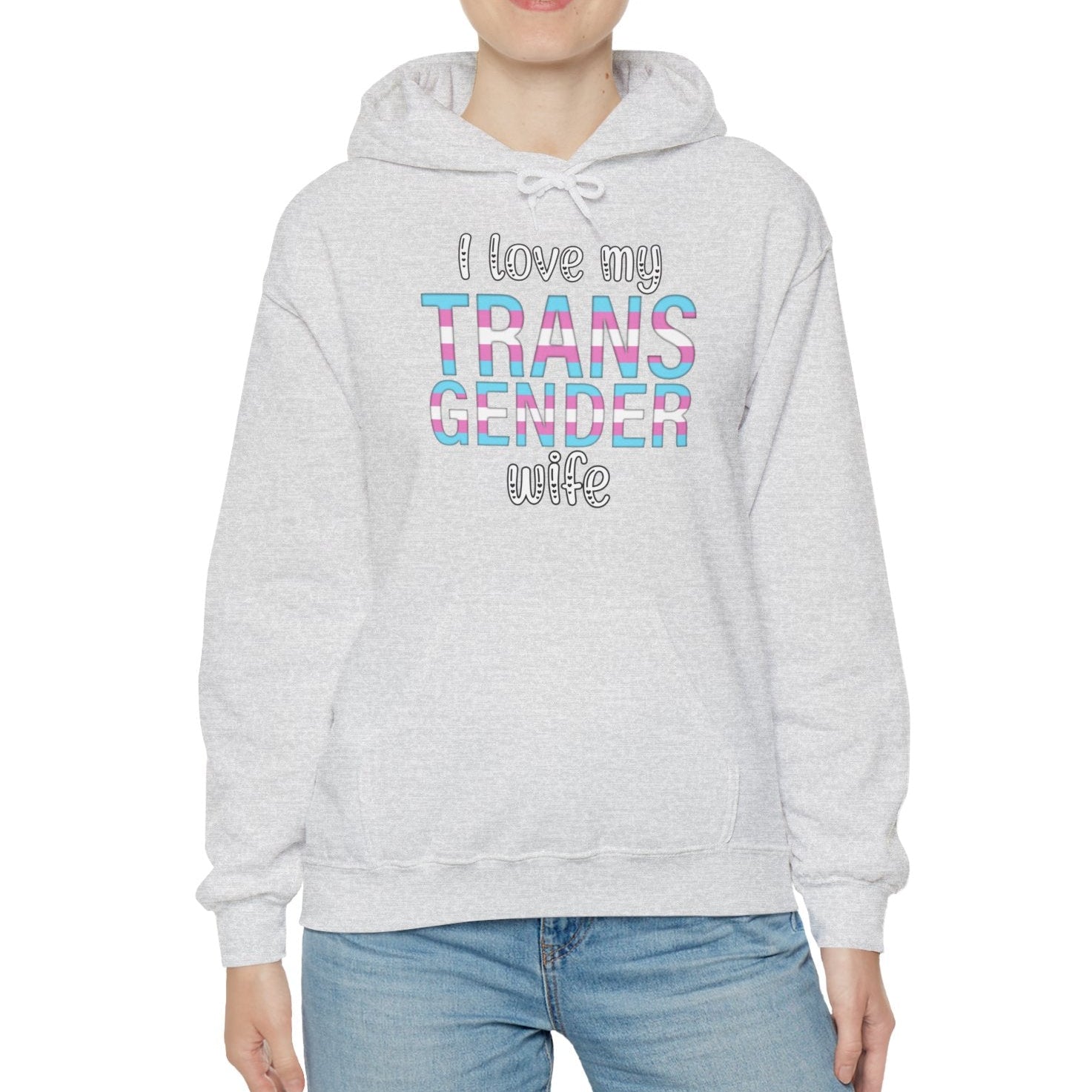 Person wearing an ash hoodie with colorful text on a white background