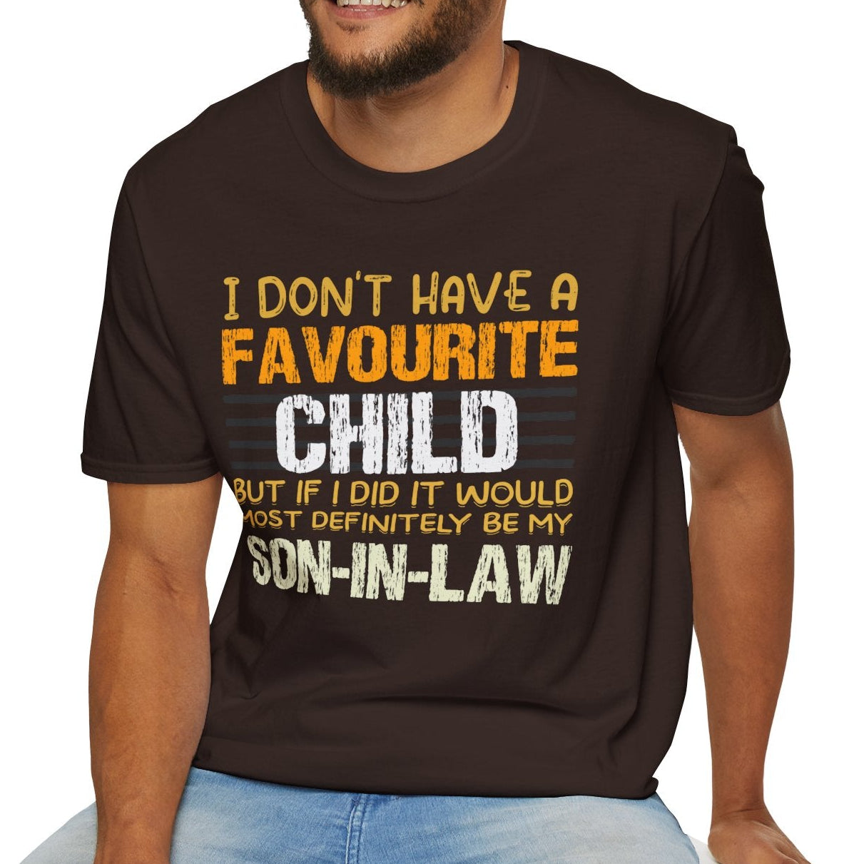 Man wearing a brown t-shirt with a colorful fun design on a white background