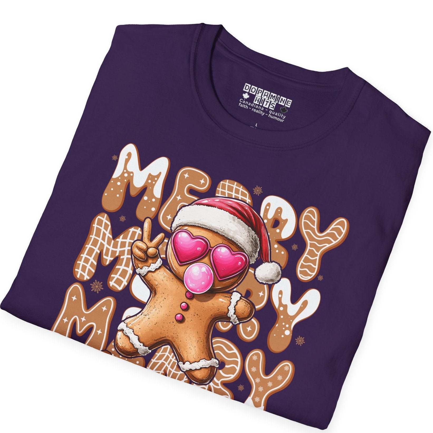 Folded purple t-shirt with a gingerbread man design and text on a white background