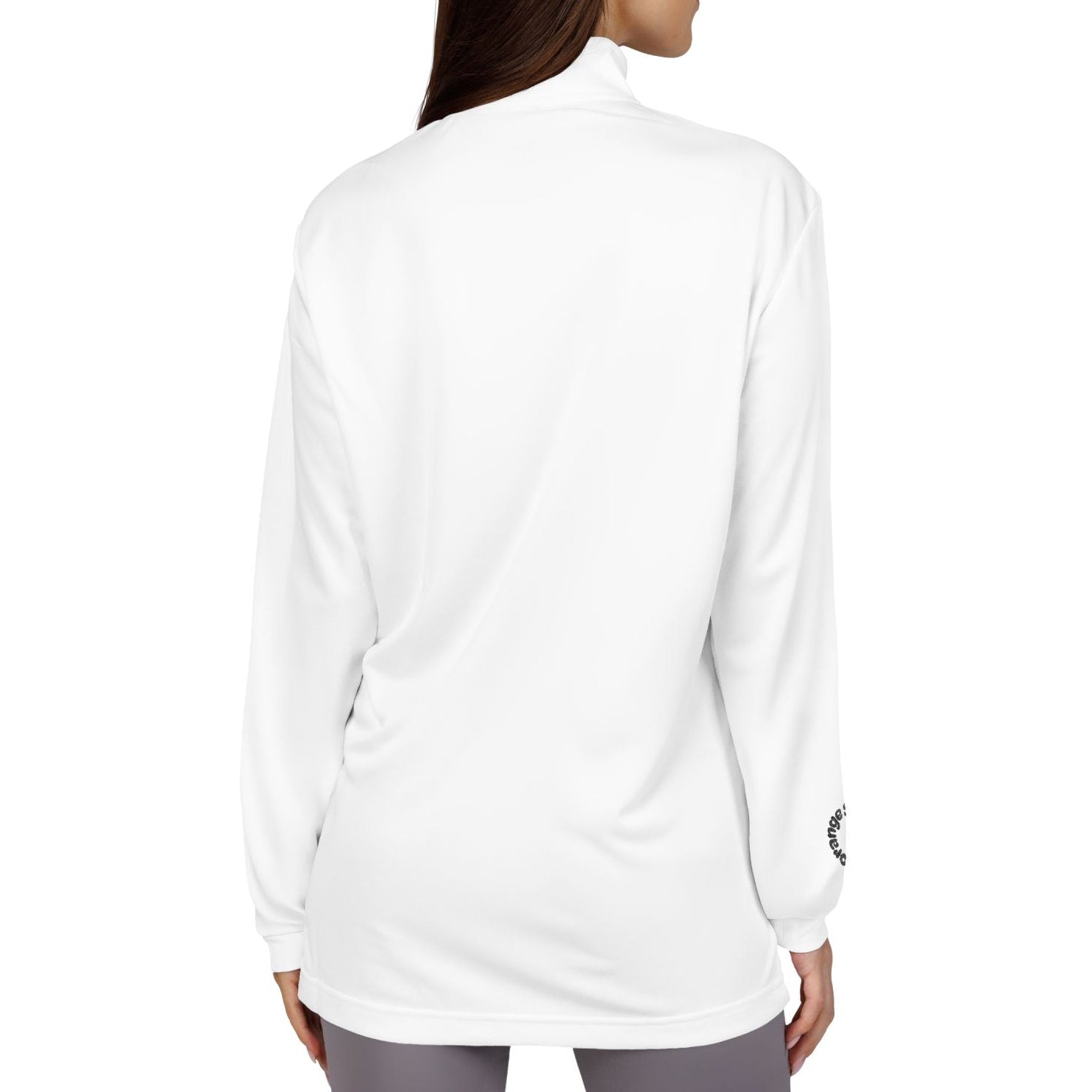 Woman wearing a white long-sleeve top on a white background