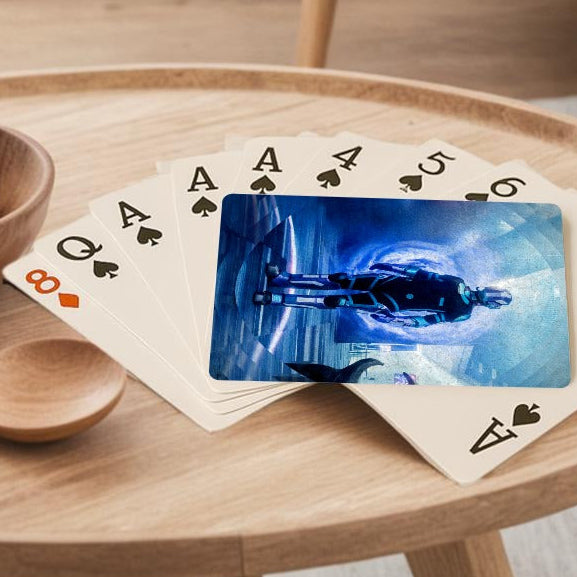 Round wooden coffee table with a bowl of lemons, wooden spoon, playing cards, and tablet displaying an underwater scene.