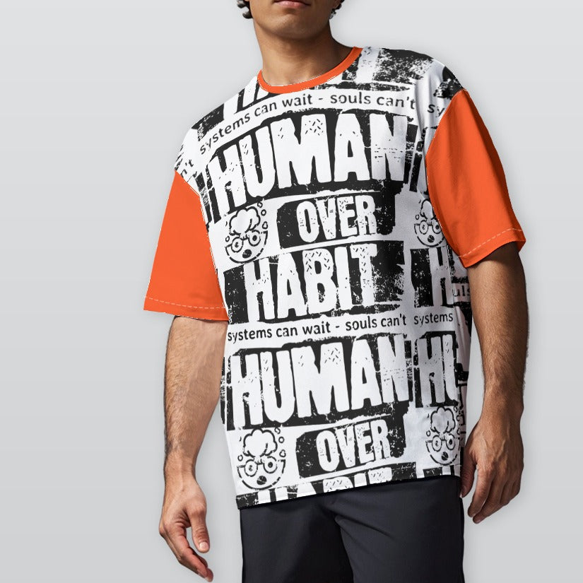 Person wearing a shirt with 'Human Over Habit' text on a plain background
