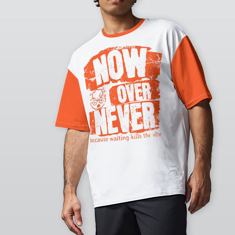 Person wearing a white and orange t-shirt with text on a plain background