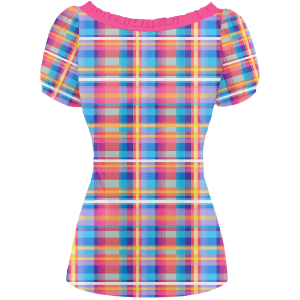 Colorful plaid dress with pink neckline on a gray background