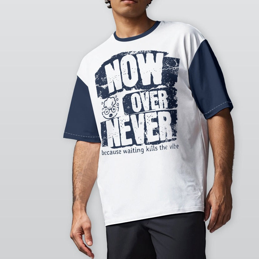 Man wearing a white and navy baseball shirt with text on a plain background