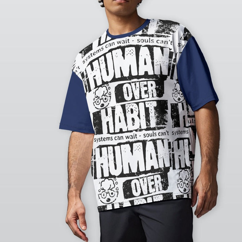 Person wearing a sleeveless shirt with 'Human Over Habit' text on a plain background