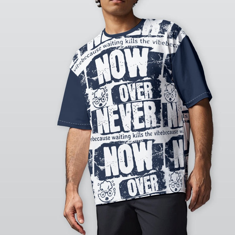 Man wearing a graphic t-shirt with text and design on a plain background