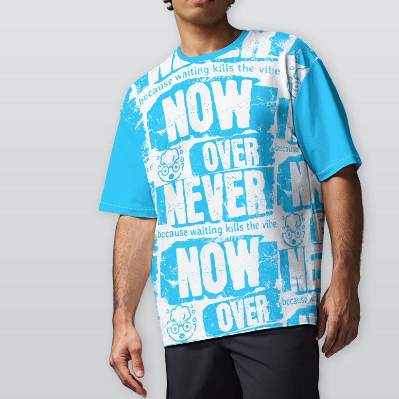 Person wearing a blue and white graphic t-shirt with text on a plain background