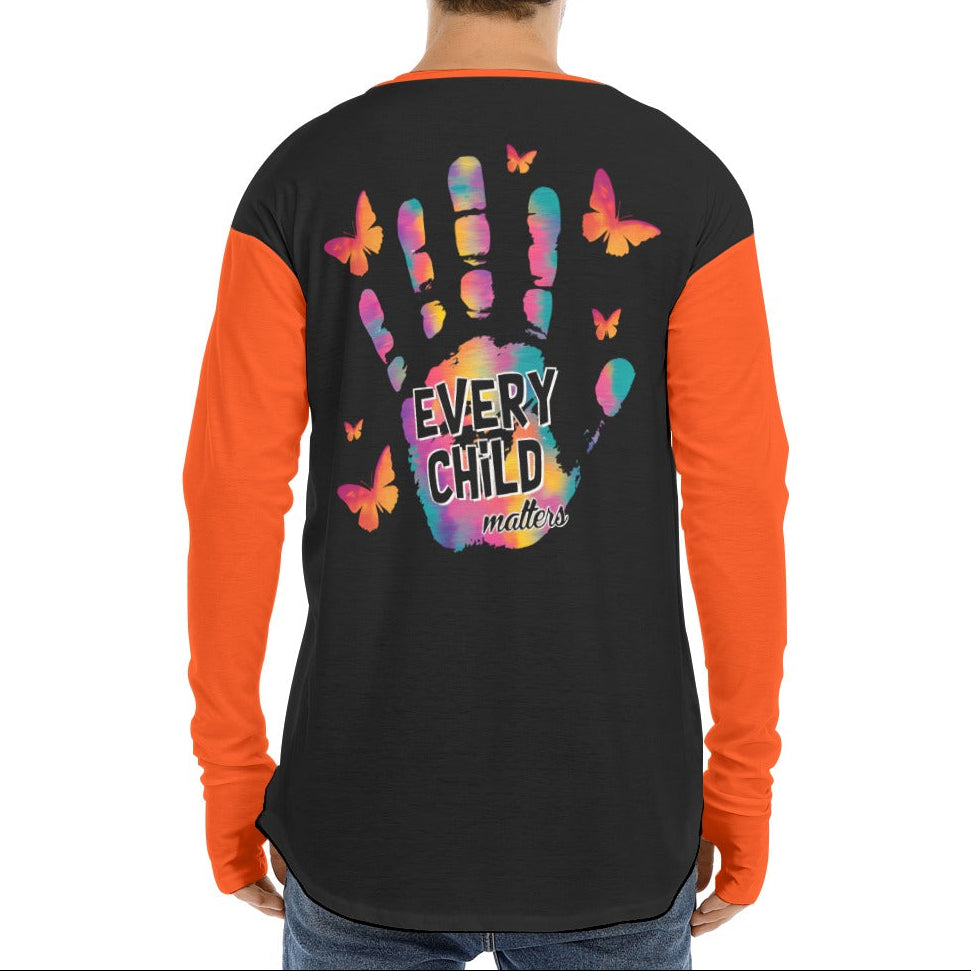 Person wearing a black and orange long-sleeve shirt with colorful handprint design and text on the back.