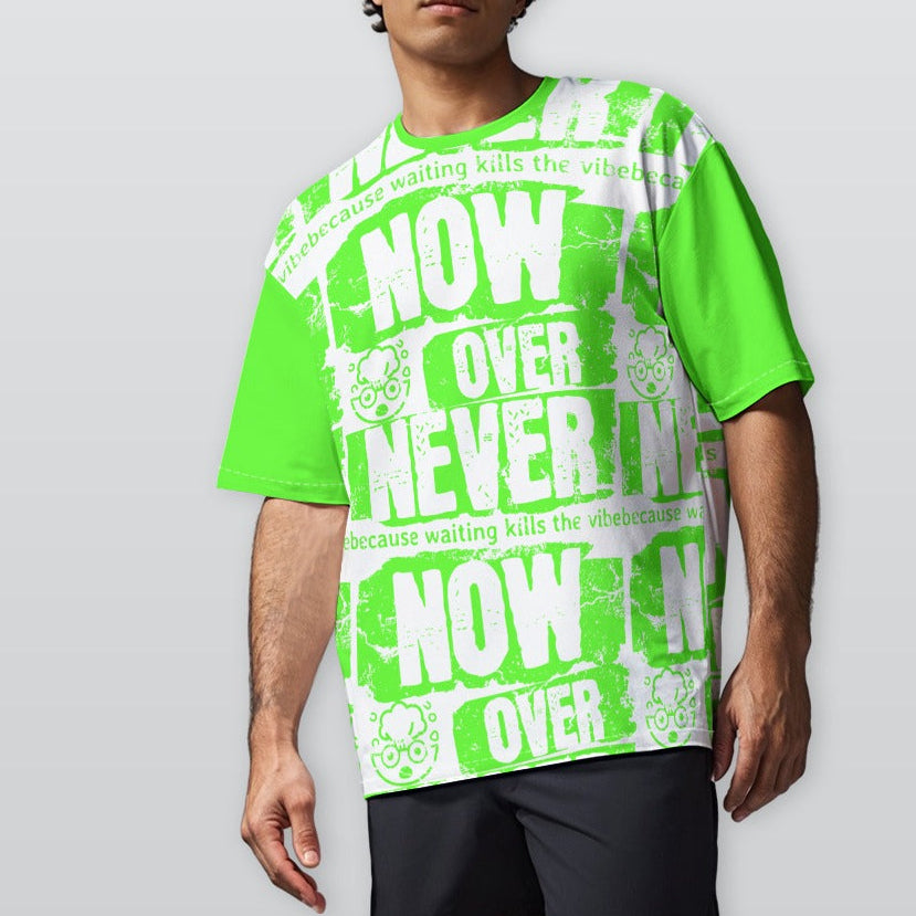 Person wearing a bright green t-shirt with text design on a plain background