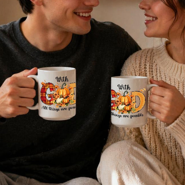 Two people sitting together holding mugs with a cozy indoor setting.