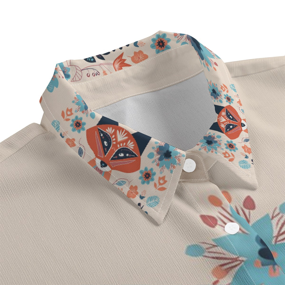 Floral and fox patterned fabric on a beige surface