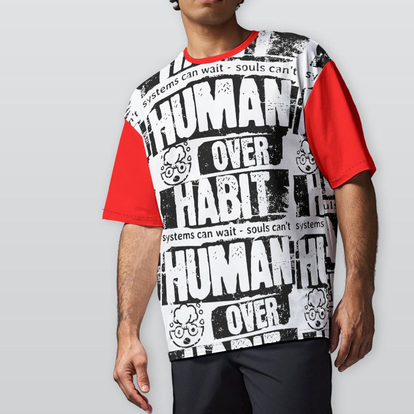 Person wearing a graphic t-shirt with text and red sleeves on a plain background