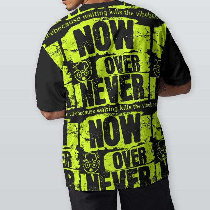 Person wearing a black and yellow graphic t-shirt with text on a plain background