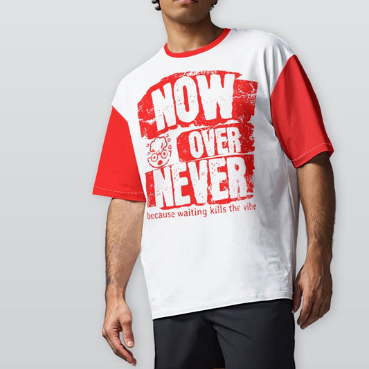 Person wearing a white and red t-shirt with text on a plain background