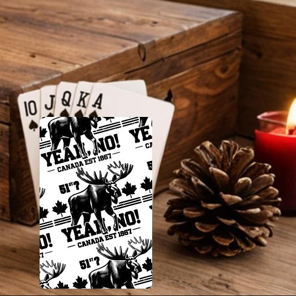 Wooden box with playing cards, pinecones, and candles on a festive background