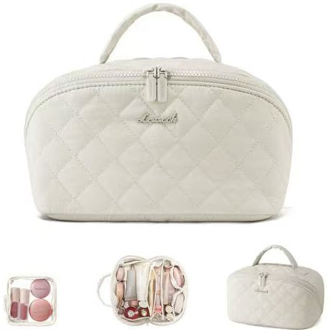 Quilted beige cosmetic bag organizer with accessories on a white background