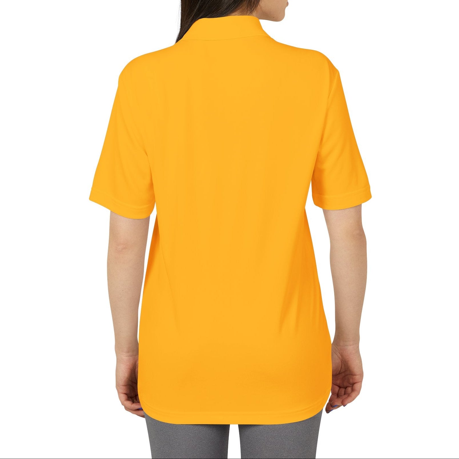 Woman wearing a yellow polo shirt on a white background