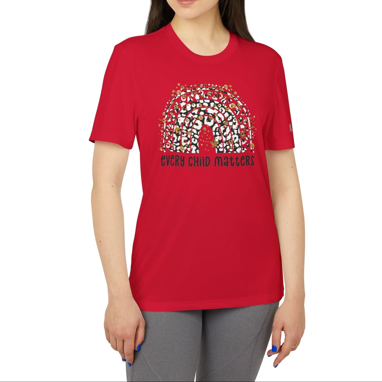 Person wearing a red t-shirt with a graphic design on a white background