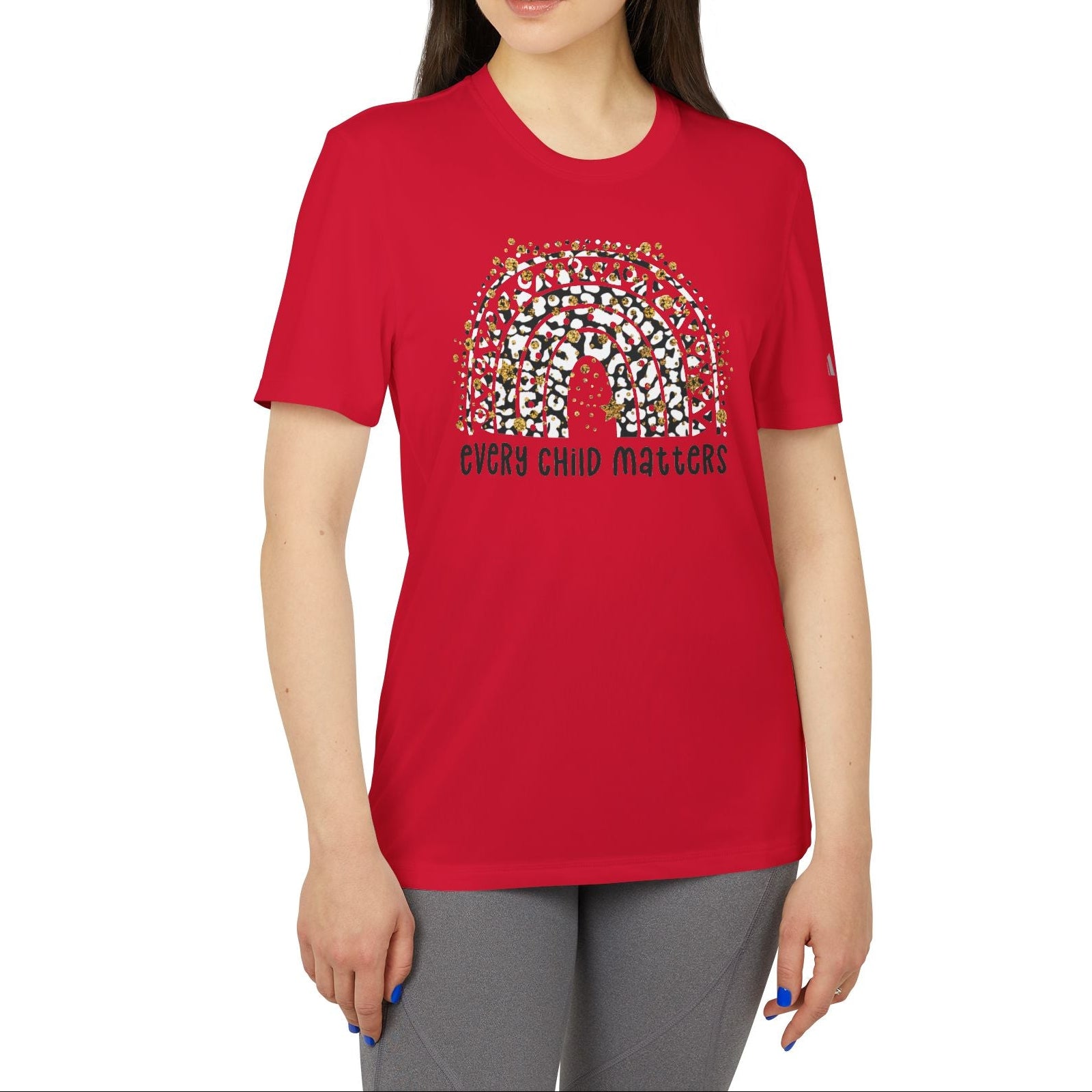 Person wearing a red t-shirt with a graphic design on a white background