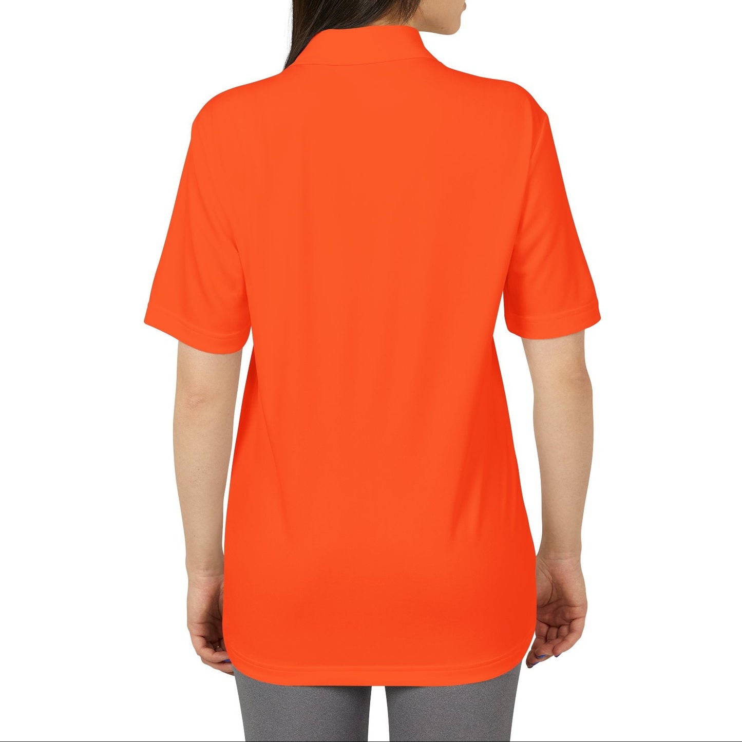 Person wearing an orange polo shirt on a white background