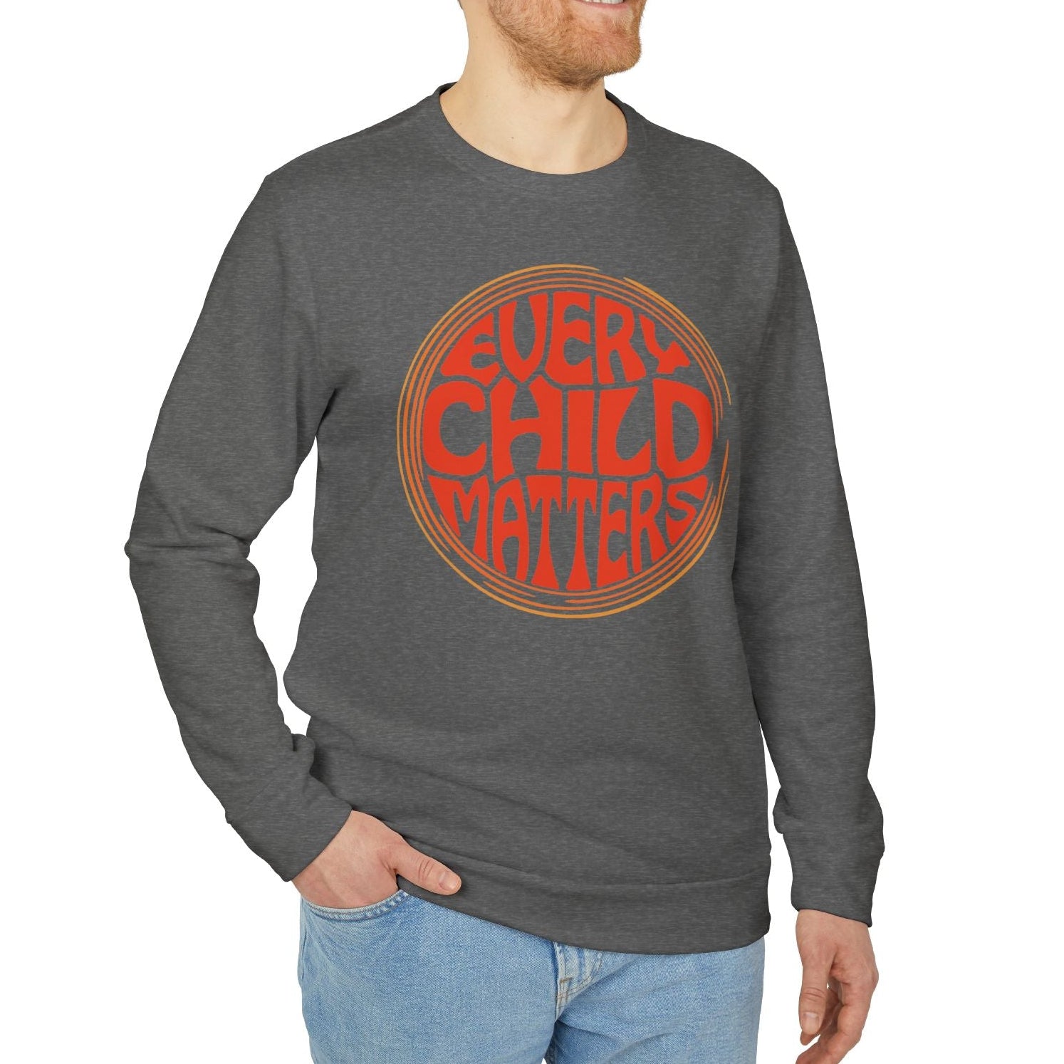 Man wearing a gray long-sleeve shirt with 'Every Child Matters' text on a white background