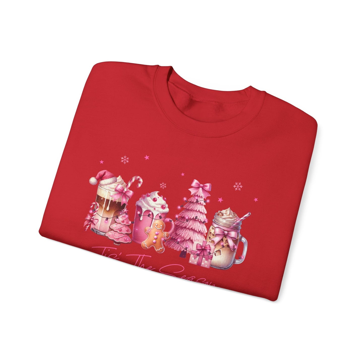 Folded red sweatshirt with Christmas-themed design on a white background