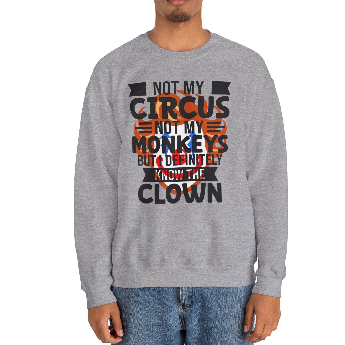 Person wearing a gray sweatshirt with a humorous text design on a white background