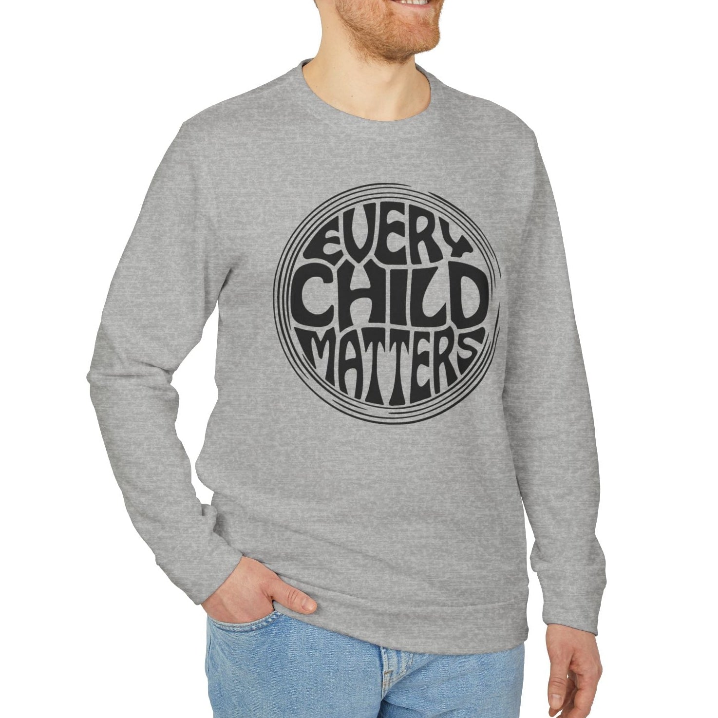 Man wearing a gray sweatshirt with 'Every Child Matters' text on a white background