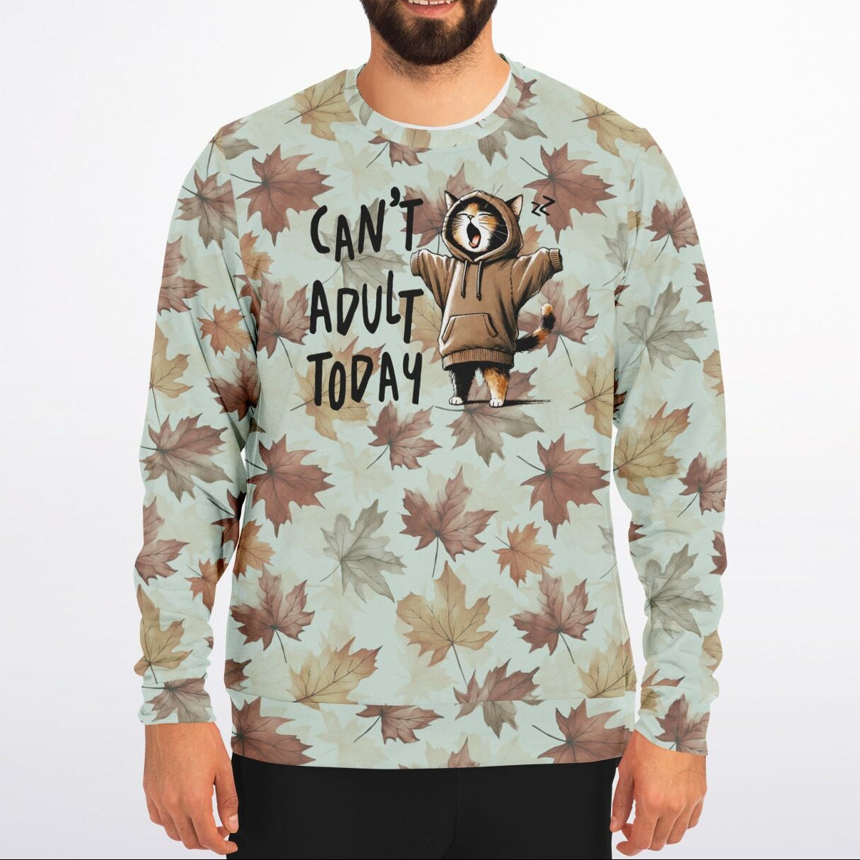 Man wearing a sweater with a leaf pattern and text design on a white background